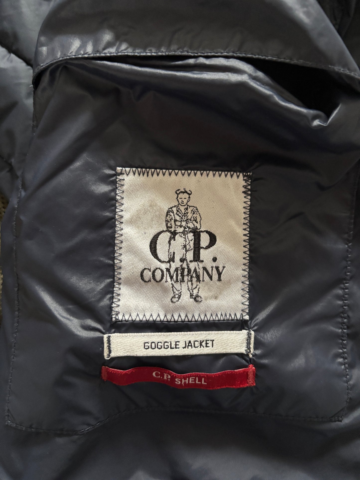 Navy and black cp company goggle gilet size large/50